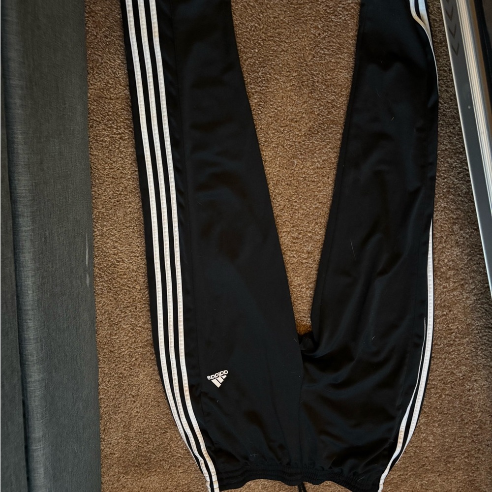 Adidas Women's Black track pants with White Stripes
